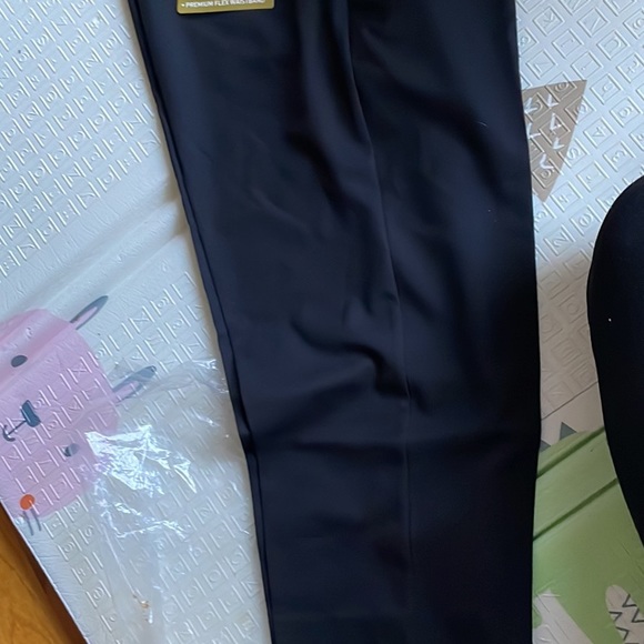 Brand new with tags. Has a grip around waste to keep shirt tucked in. Slim fit. - Picture 5 of 6